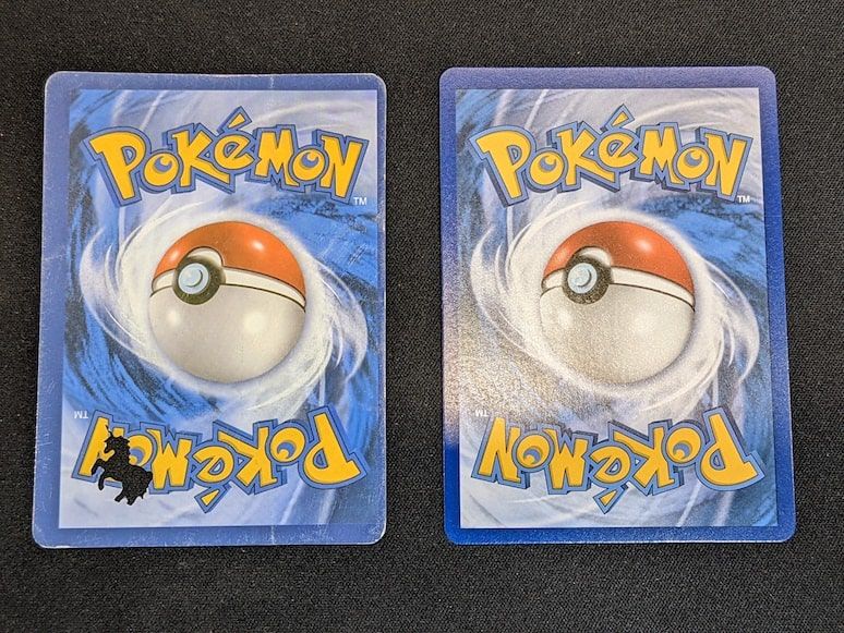 Fake and real Pokémon cards backs 2
